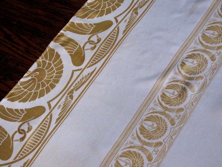 close up vintage antique tablecloth figural damask