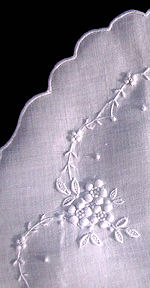 vintage oval doily handmade whitework on white linen