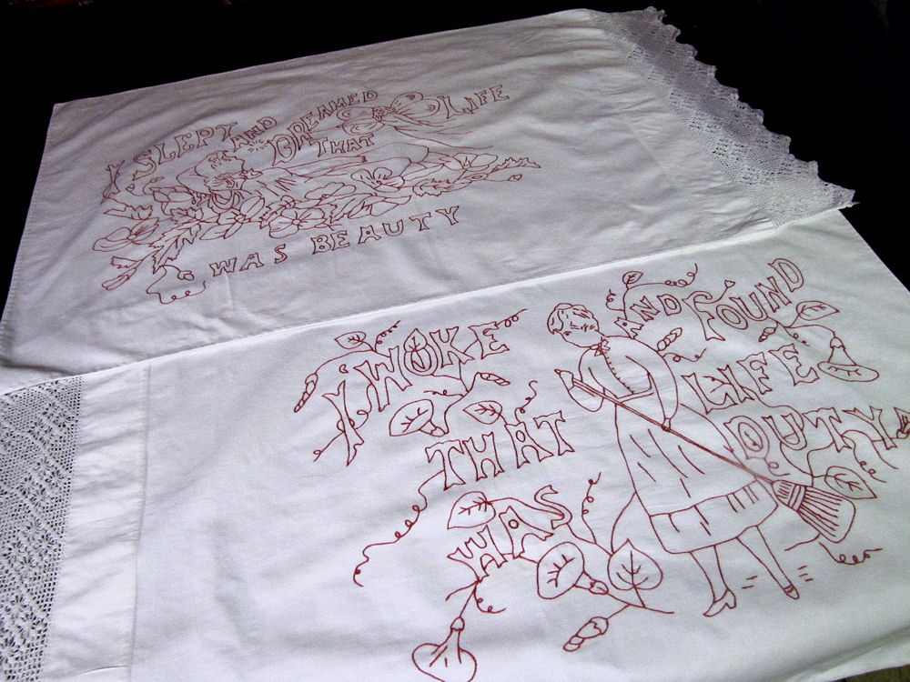 close up 3 vintage antique pair pillowcases with handmade lace and redwork embroidery