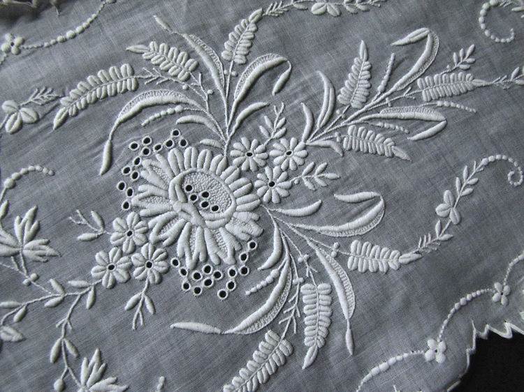 close up antique vintage victorian lappet with handmade whitework