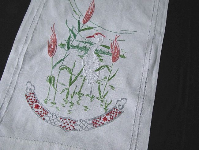 close-up hand embroidered egret on vintage table runner dresser scarf