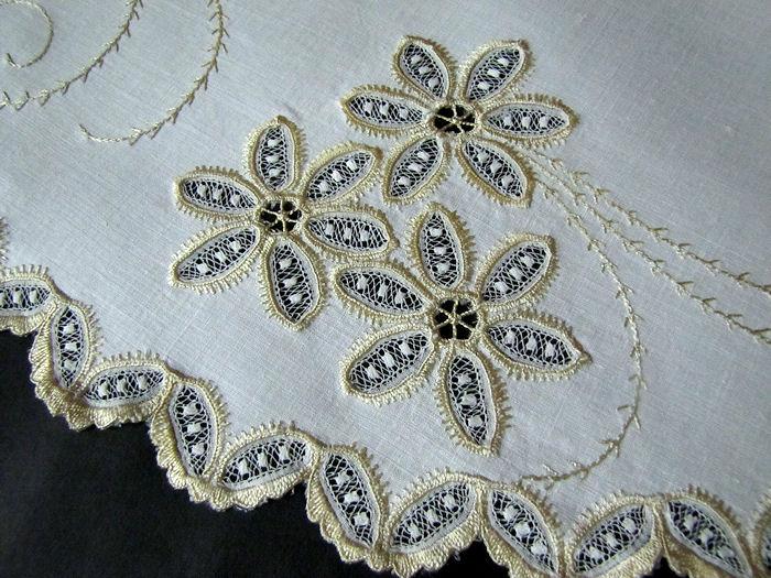 close up vintage antique linen table topper with society silk embroidery and hand embroidery