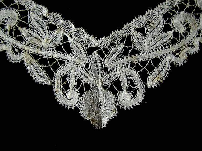 close up antique collar handmade bobbin lace