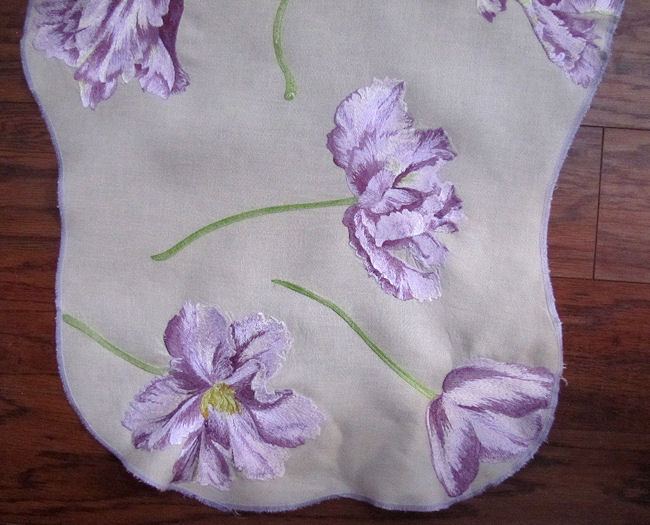 close-up purple flowers on vintage table runner dresser scarf