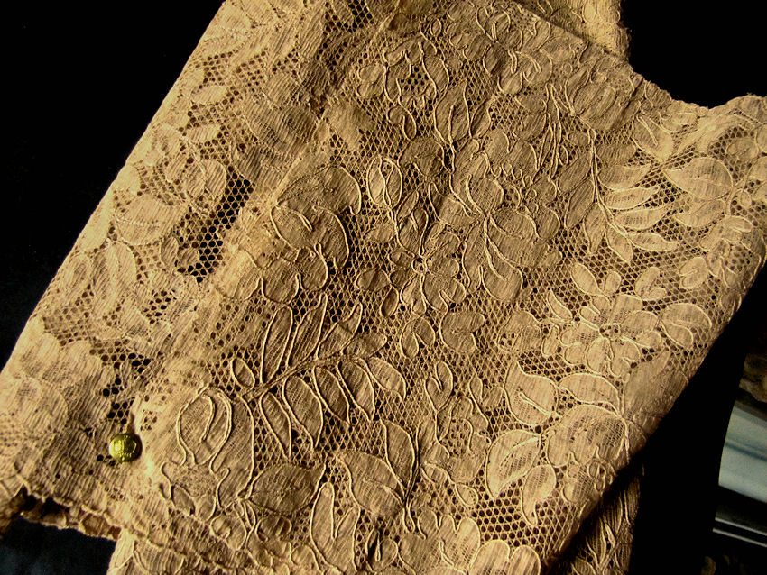 close up vintage antique Alencon lace with tags