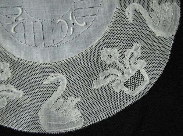 close up pair vintage antique figural lace doilies