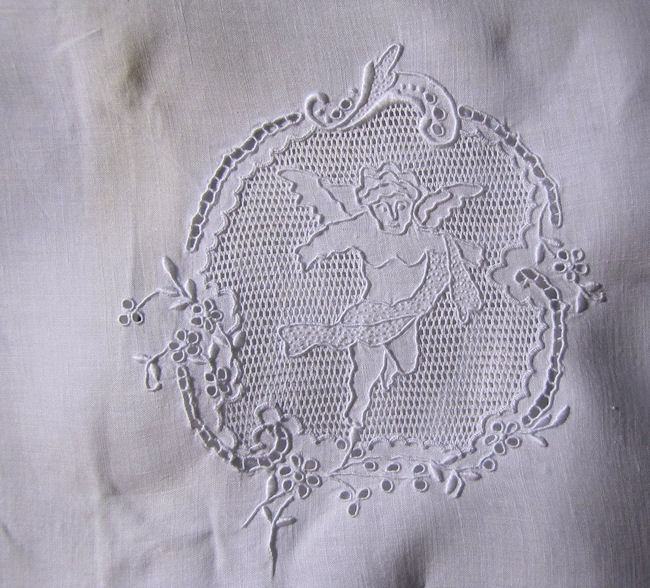 close up vintage pillowcover handmade Appenzell figural lace cherub