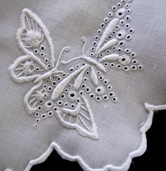 vintage antique white linen doily with handmade figural lace and whitework butterflies