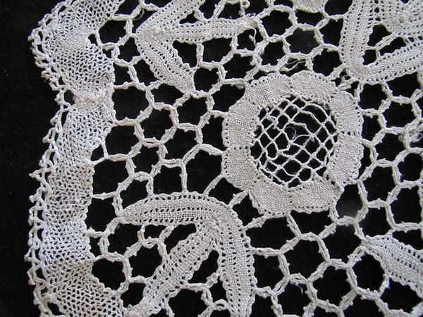 close up vintage antique table topper handmade bobbin lace