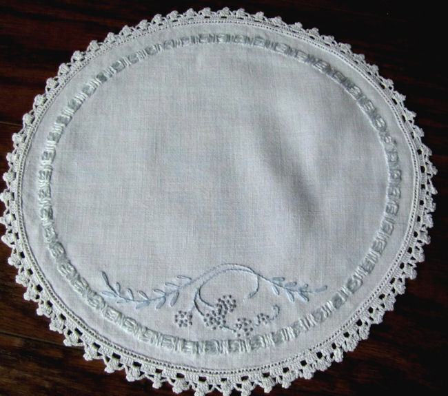 close up pair vintage white linen round doilies handmade lace blue embroidery