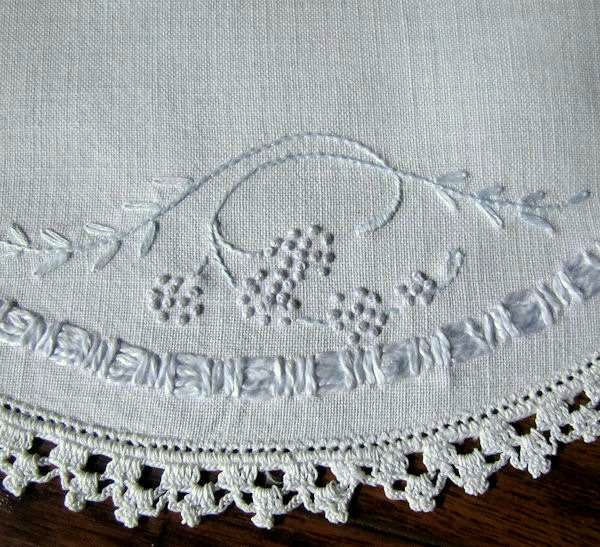 close up 2 pair vintage white linen round doilies handmade lace blue embroidery