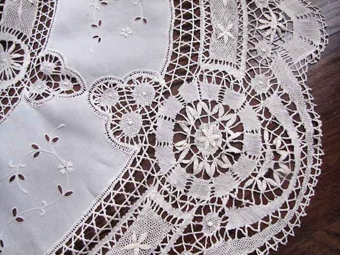close up 2 vintage antique handmade round tablecloth Cluny and figural lace