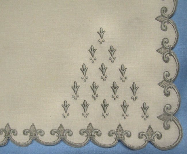 close up vintage linen embroidered placemat by Marghab