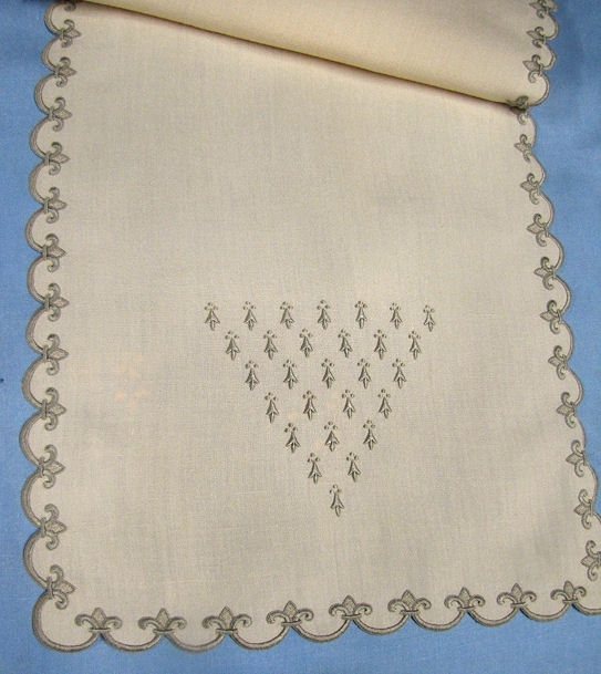 close up vintage linen embroidered table runner by Marghab
