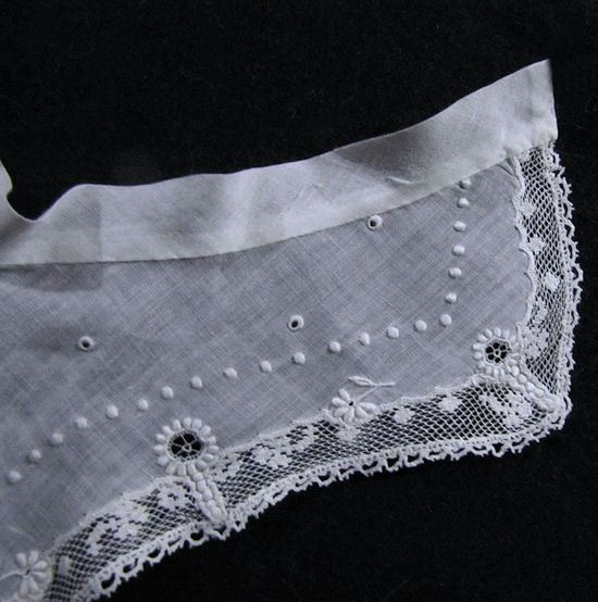 end of collar lace and whitework close-up