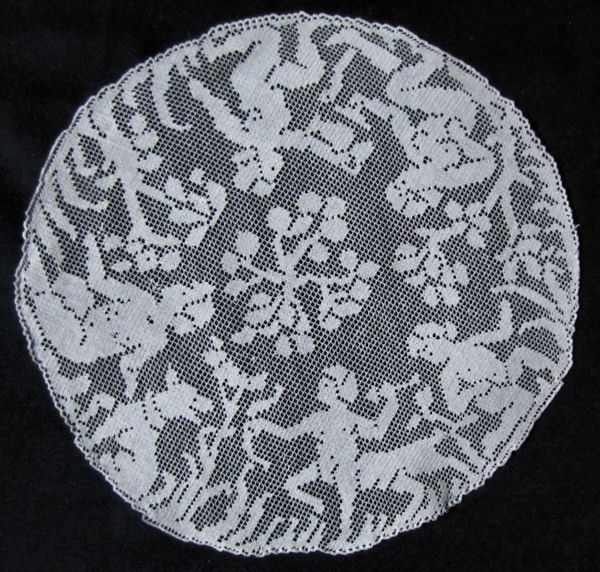 vintage handmade figural lace doily