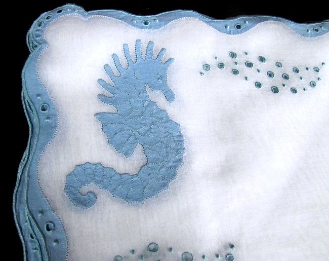 close up vintage placemats & napkins handmade lace and embroidery seahorses maybe Marghab
