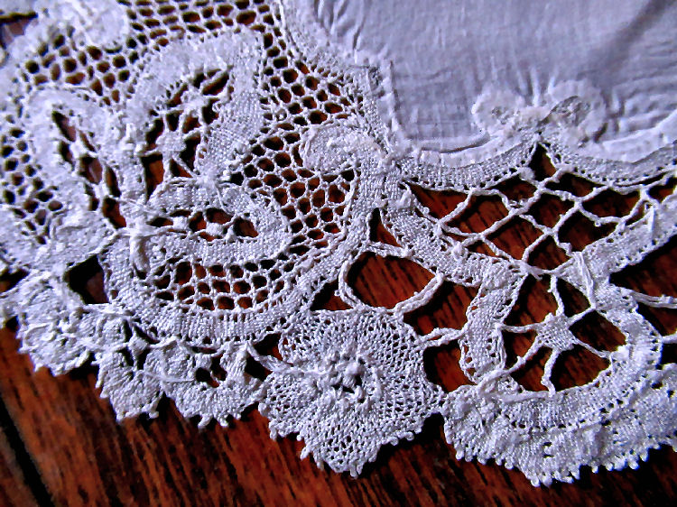 magnified close up vintage  antique handmade doilies bobbin lace