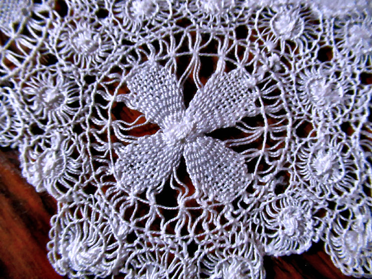 close up vintage  antique centerpiece doily hairpin lace tenerife needle lace