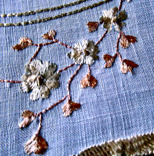 close up vintage  antique handmade society silk embroidered doily