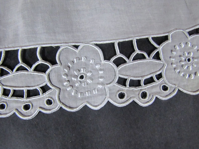 close up vintage antique doily with cutwork lace