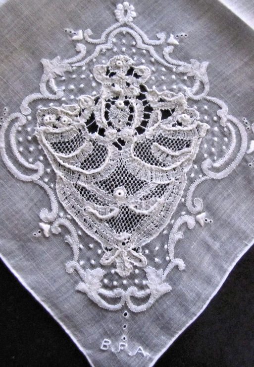 close up vintage antique whitework hanky handmade cutwork lace