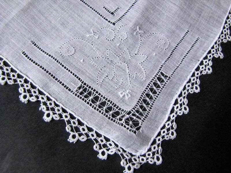 close up vintage antique handmade whitework hanky lace and embroidery