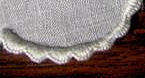 buttonhole stitched mini scallops on marghab cocktail napkin