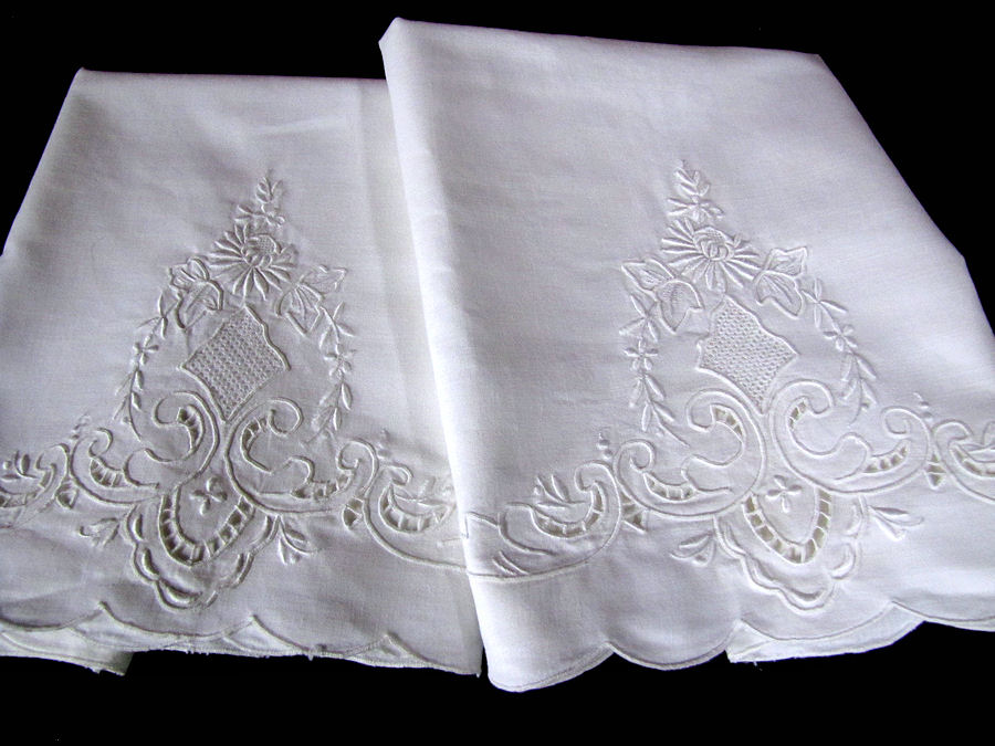 close up 2 pair vintage antique pillowcases lace and whitework embroidery
