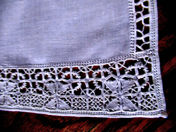 close-up corner vintage  antique handmade placemats white linen handmade lace
