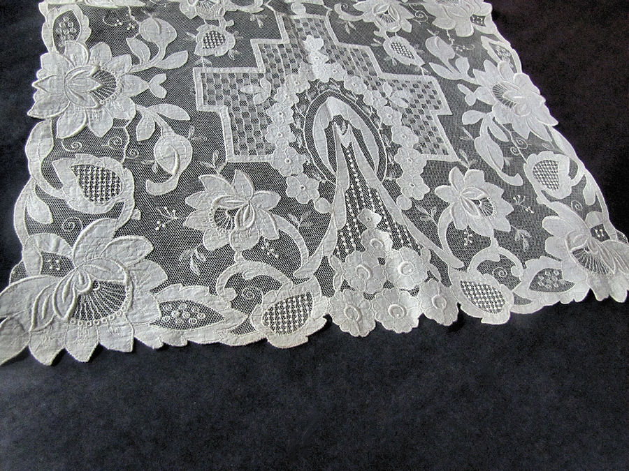 close up vintage antique table runner carrickmacross lace