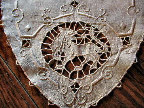 vintage  antique handmade figural lace table runner close up lion