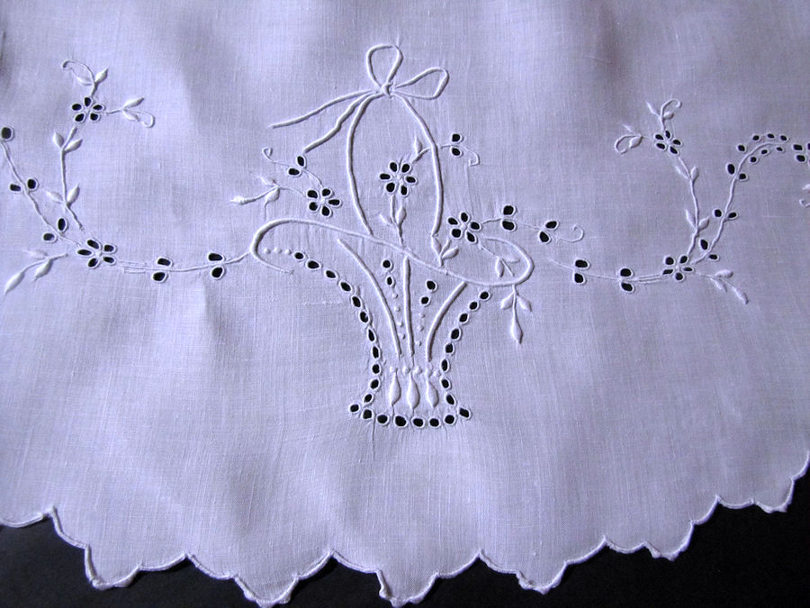 close up vintage antique table topper handmade madeira whitework