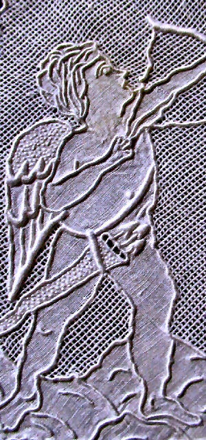 vintage antique table topper close up appenzell figural lace cupid