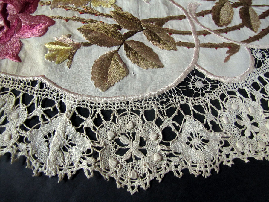 close up vintage antique society silk, handmade lace table topper